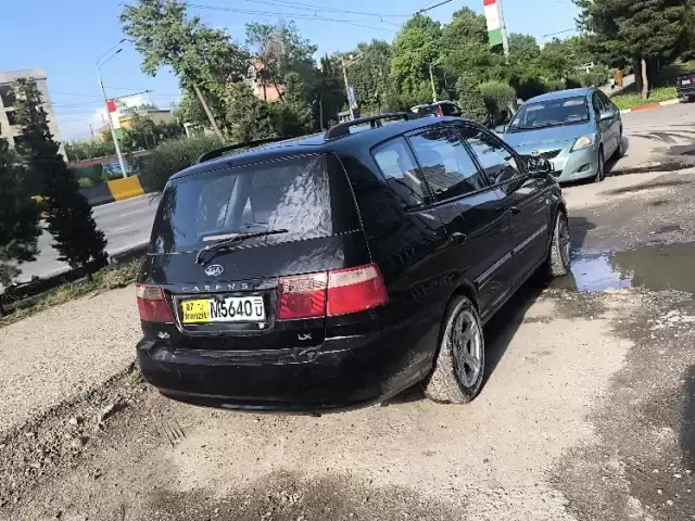 Kia Carens, 2004 1, avtobaza.tj