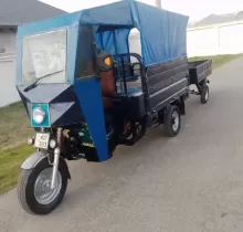 Гурзавой мотороллер, 2013 в Куляб 